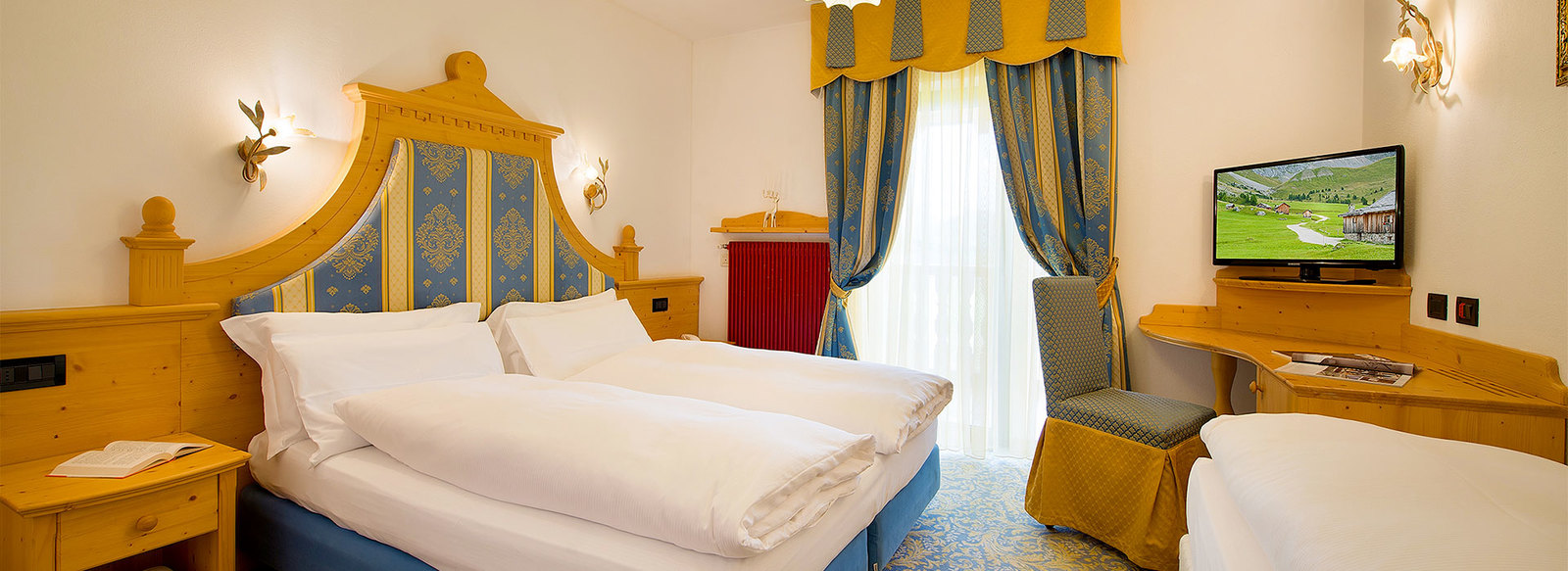 Storico ed elegante hotel 3*S nel cuore della Val di Fassa