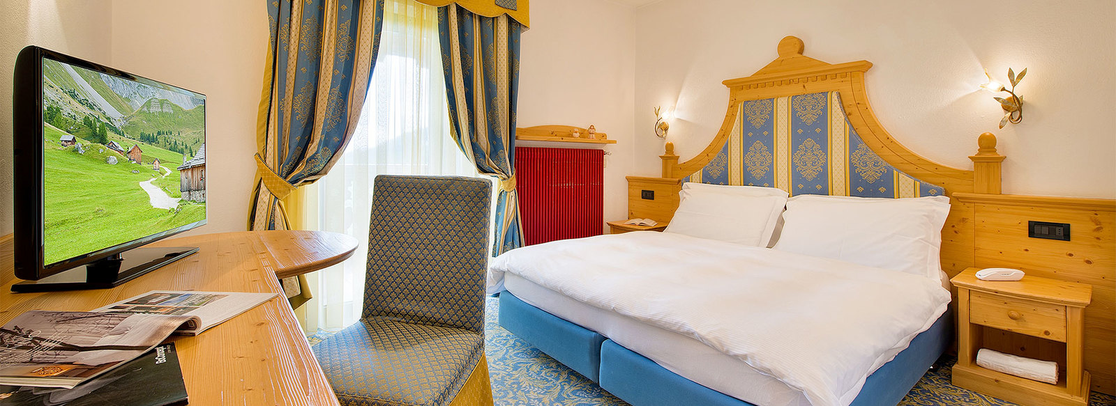Storico ed elegante hotel 3*S nel cuore della Val di Fassa