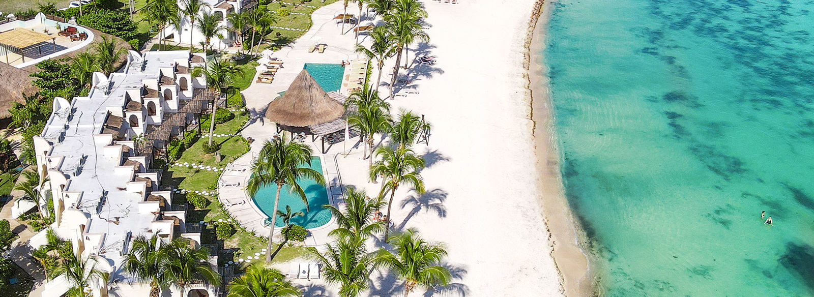 Un'oasi di relax sulle bianche spiagge della Riviera Maya